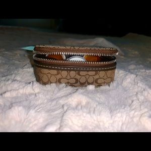 Coach pill case